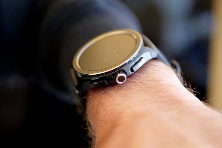 The side of the Xiaomi Watch 2 Pro on a person's wrist.
